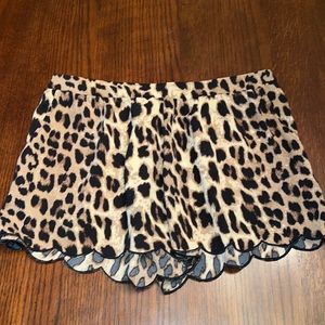 Size large cheetah print shorts with pockets!